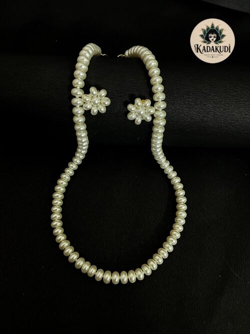 Pearl Button Necklace with Flower Studs Pearl Button Necklace with Flower Studs by Kadakudi
